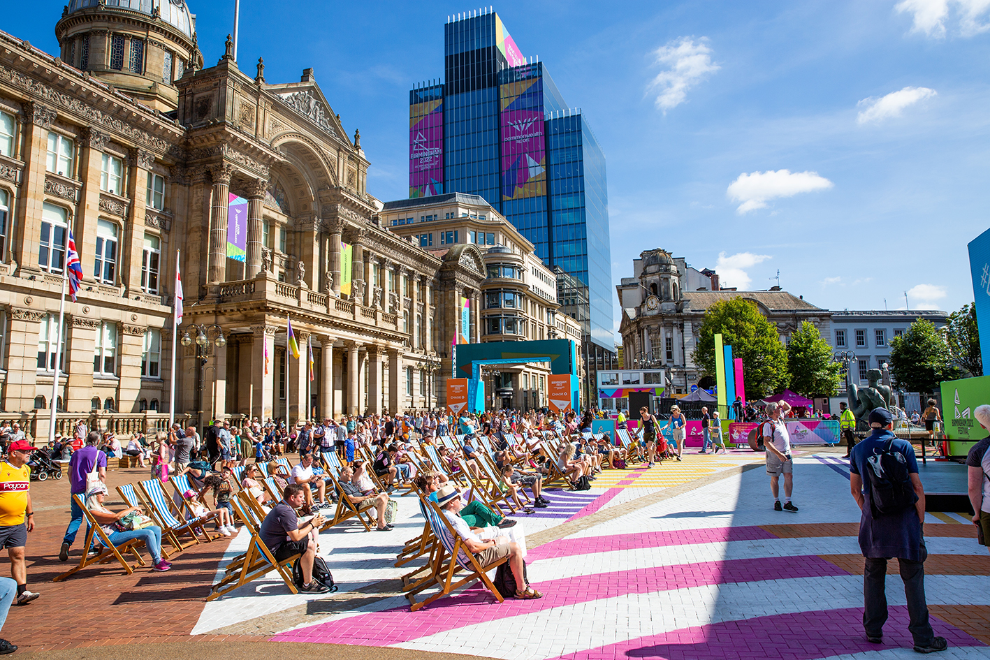 People sitting in the city centre talking about a Birmingham technology recruitment agency