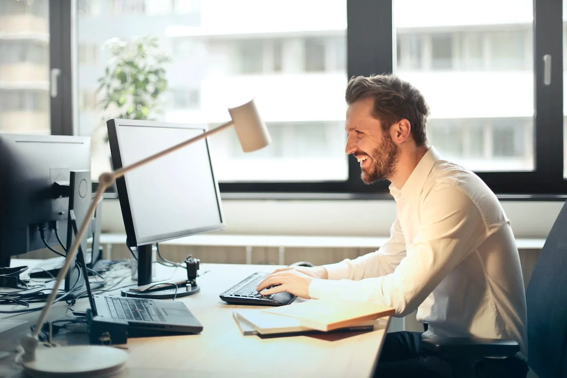 Man smiling because he know nows everything to do with IT contract recruitment from this blog