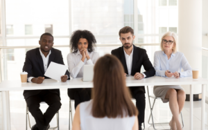 A hiring committee interviewing an individual safe in the knowledge it's not a bad hire as they know the 6 interview red flags for employers to watch out for