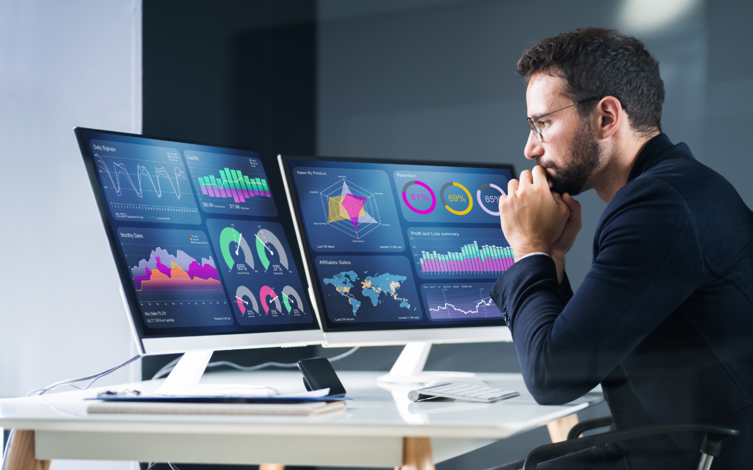 man looking at data analytics trends on his computer